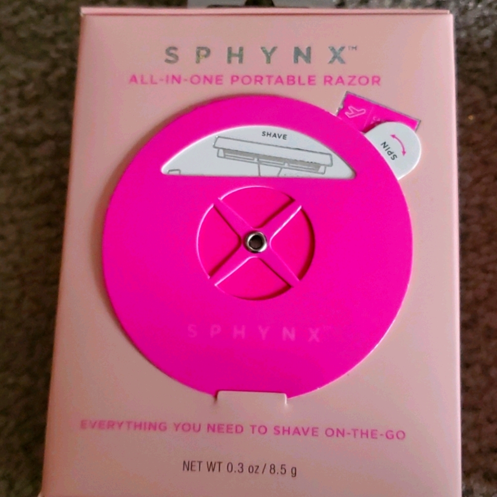 - Sphynx portable razor and box of 4 refills